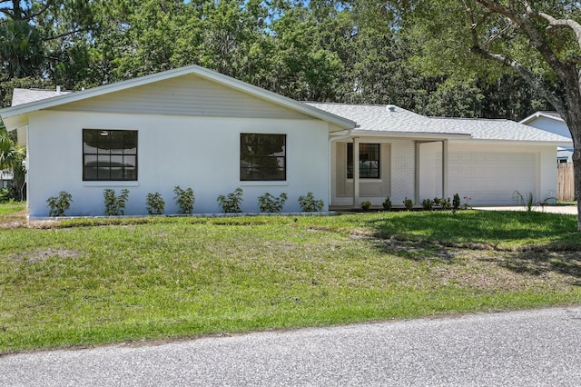 43 Courtney Pl, Palm Coast, FL 32137 - single story home with a garage, a front lawn, a shingled roof, and brick siding