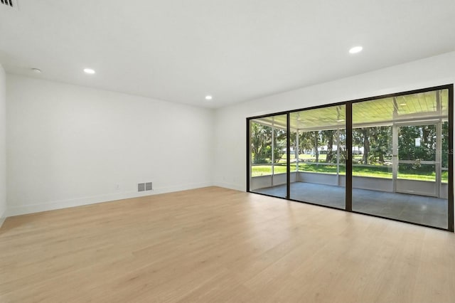 43 Courtney Pl, Palm Coast, FL 32137 - unfurnished room with light wood-type flooring and recessed lighting