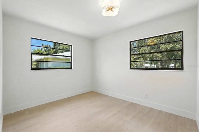 43 Courtney Pl, Palm Coast, FL 32137 - spare room with light wood finished floors and baseboards