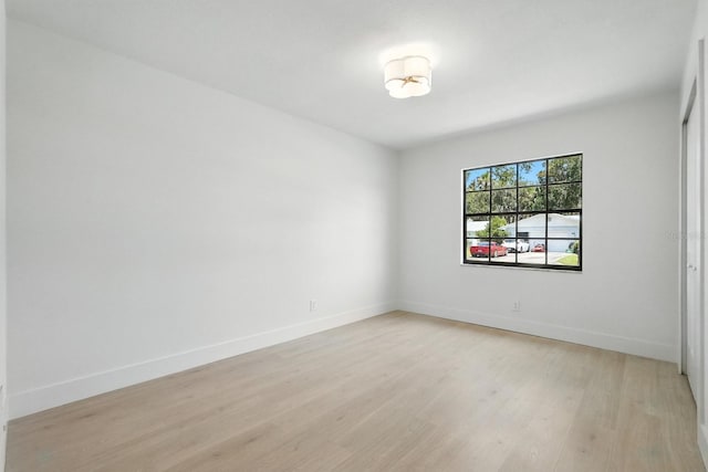 43 Courtney Pl, Palm Coast, FL 32137 - spare room with light wood-style flooring and baseboards
