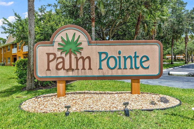 4600 E Moody Blvd Unit 14O, Bunnell, FL 32110 - community sign with a lawn