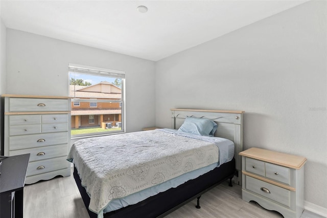 4600 E Moody Blvd Unit 14O, Bunnell, FL 32110 - bedroom with light wood-style flooring and baseboards