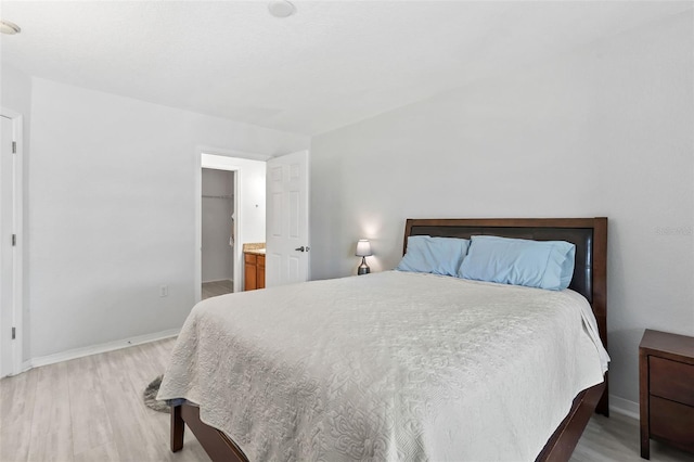 4600 E Moody Blvd Unit 14O, Bunnell, FL 32110 - bedroom featuring light wood finished floors and baseboards