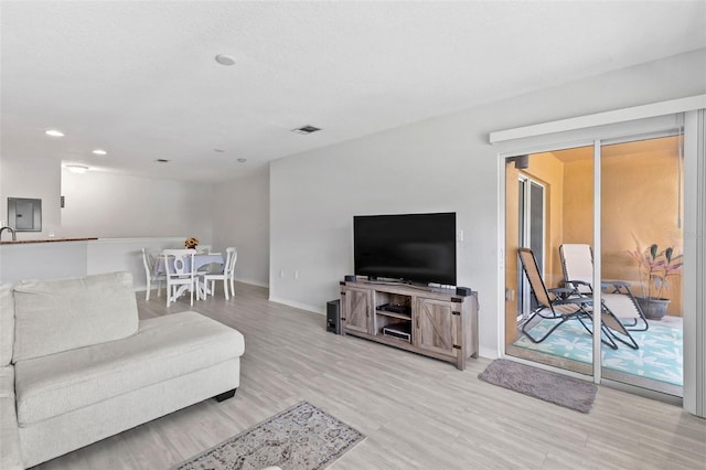 4600 E Moody Blvd Unit 14O, Bunnell, FL 32110 - living area with light wood finished floors and recessed lighting