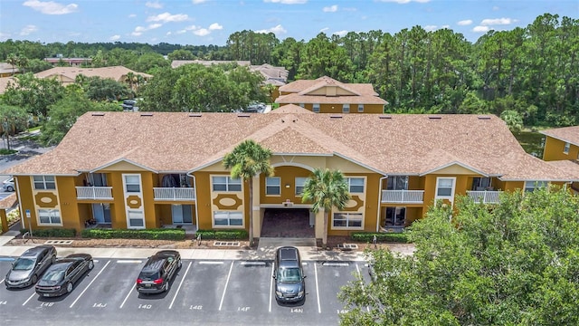 4600 E Moody Blvd Unit 14O, Bunnell, FL 32110 - view of building exterior with uncovered parking