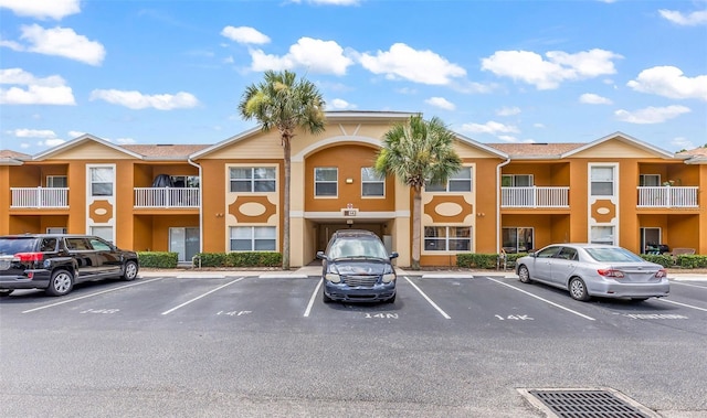 4600 E Moody Blvd Unit 14O, Bunnell, FL 32110 - view of property featuring uncovered parking
