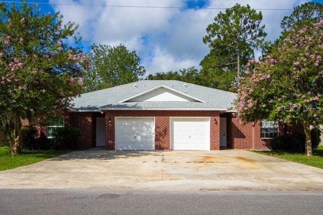 6 Ponderosa Ln Unit A & B, Palm Coast, FL 32164 - photo 2