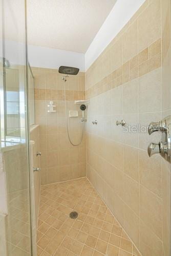 7 Flint Pl, Palm Coast, FL 32137 - bathroom with a stall shower