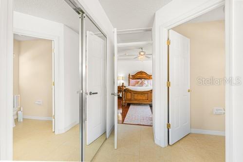 7 Flint Pl, Palm Coast, FL 32137 - hallway featuring baseboards
