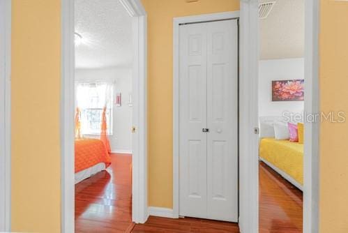7 Flint Pl, Palm Coast, FL 32137 - hallway with wood finished floors and baseboards