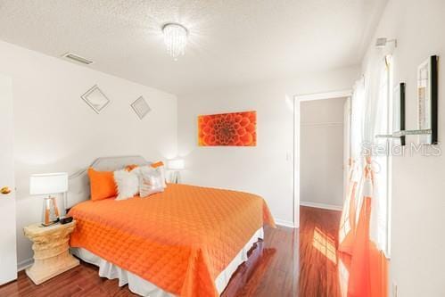 7 Flint Pl, Palm Coast, FL 32137 - bedroom with wood finished floors and baseboards