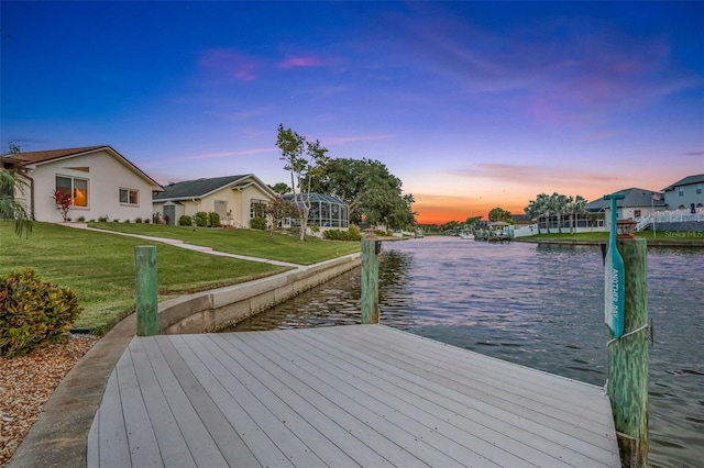 33 Crystal Bay Ct, Palm Coast, FL 32137 - dock area featuring a water view and a lawn