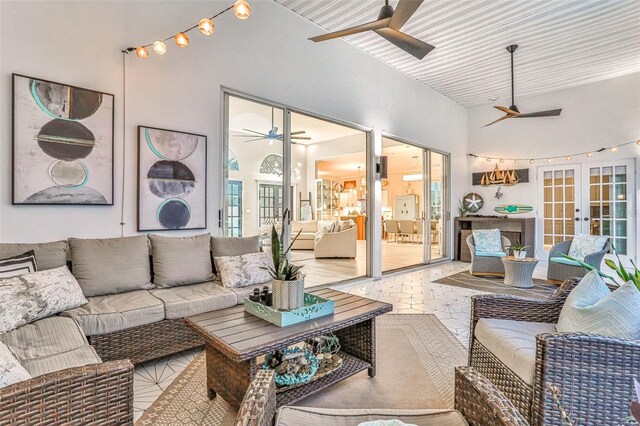 33 Crystal Bay Ct, Palm Coast, FL 32137 - living area with a ceiling fan, french doors, track lighting, and tile patterned flooring
