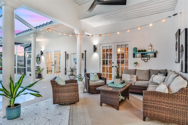 33 Crystal Bay Ct, Palm Coast, FL 32137 - living area with french doors, decorative columns, and ceiling fan