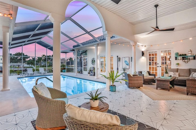 33 Crystal Bay Ct, Palm Coast, FL 32137 - swimming pool with french doors, outdoor lounge area, a patio area, and a ceiling fan