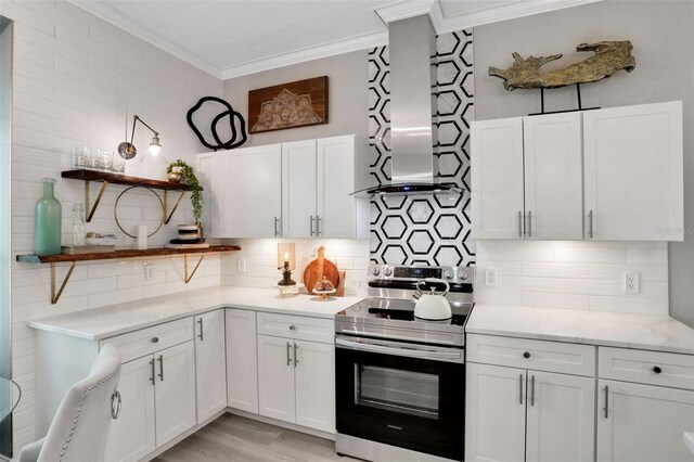 33 Crystal Bay Ct, Palm Coast, FL 32137 - kitchen featuring stainless steel electric range, open shelves, crown molding, wall chimney exhaust hood, and backsplash