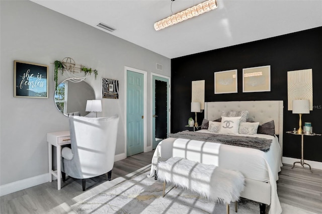 33 Crystal Bay Ct, Palm Coast, FL 32137 - bedroom featuring wood finished floors and baseboards