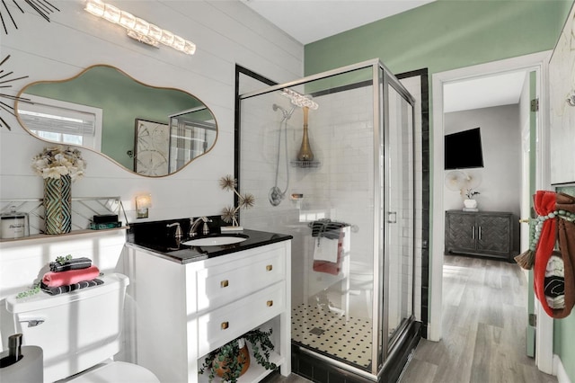 33 Crystal Bay Ct, Palm Coast, FL 32137 - full bath with a stall shower, vanity, and wood finished floors