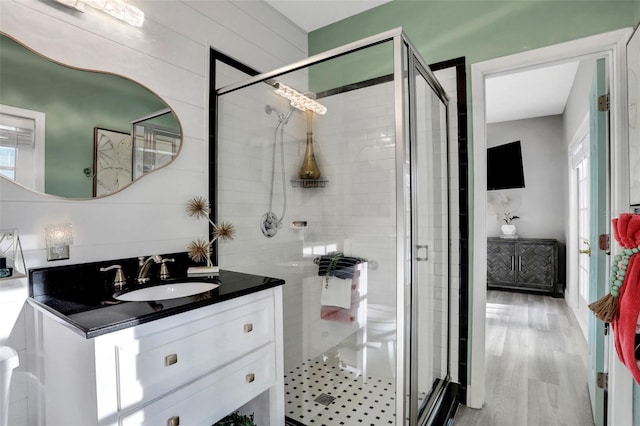 33 Crystal Bay Ct, Palm Coast, FL 32137 - full bathroom with a shower stall, vanity, and wood finished floors