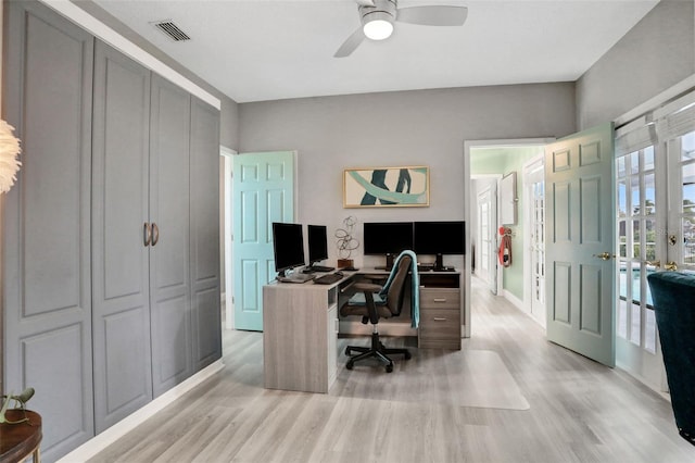 33 Crystal Bay Ct, Palm Coast, FL 32137 - home office with light wood finished floors and ceiling fan