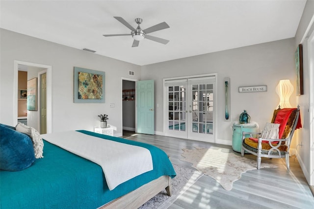33 Crystal Bay Ct, Palm Coast, FL 32137 - bedroom with french doors, wood finished floors, and ceiling fan