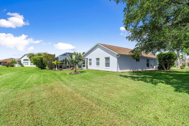 1904 Rouzbeh Ct, Port Orange, FL 32128 - view of green lawn with glass enclosure