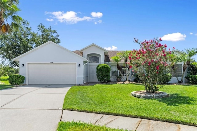 1904 Rouzbeh Ct, Port Orange, FL 32128 - ranch-style house featuring an attached garage, concrete driveway, stucco siding, and a front lawn