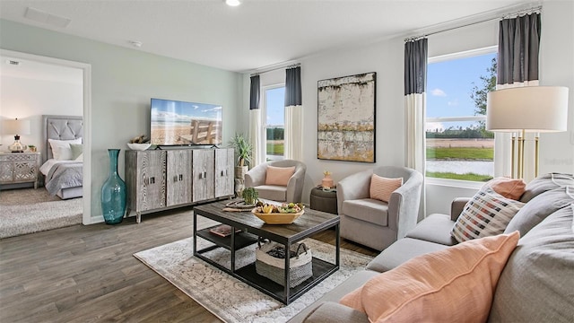 8 Mill Wheel Ct S, Palm Coast, FL 32137 - living room with healthy amount of natural light, wood finished floors, and recessed lighting