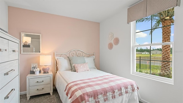 8 Mill Wheel Ct S, Palm Coast, FL 32137 - carpeted bedroom with baseboards