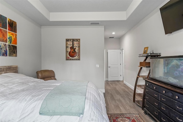9 Elder Pl, Palm Coast, FL 32164 - bedroom with light wood-style floors and baseboards