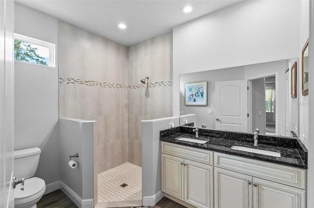 9 Elder Pl, Palm Coast, FL 32164 - full bath featuring a walk in shower, double vanity, wood finished floors, and recessed lighting