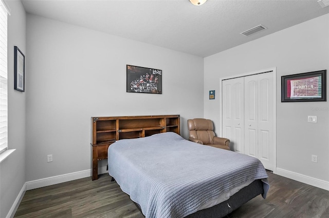 9 Elder Pl, Palm Coast, FL 32164 - bedroom with wood finished floors and a closet