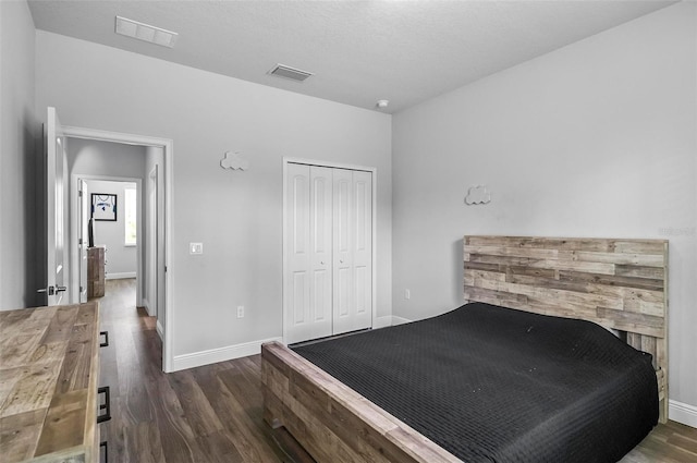 9 Elder Pl, Palm Coast, FL 32164 - bedroom with wood finished floors and a closet