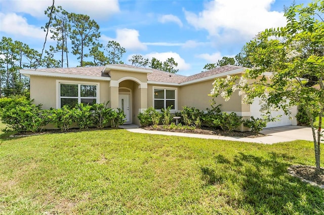 9 Elder Pl, Palm Coast, FL 32164 - single story home with stucco siding, driveway, and a front yard