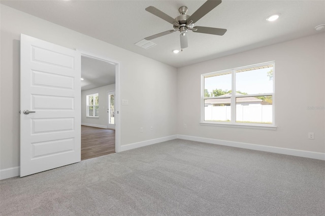 16 Service Tree Pl, Palm Coast, FL 32164 - spare room with carpet flooring, ceiling fan, recessed lighting, and a smoke detector
