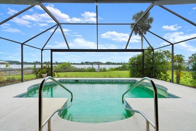 2940 Sunset Dr, New Smyrna Beach, FL 32168 - swimming pool with a water view, a patio, and a lanai