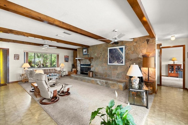 2940 Sunset Dr, New Smyrna Beach, FL 32168 - tiled living room featuring ceiling fan, beam ceiling, and a fireplace