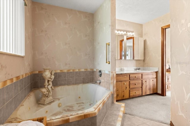 2940 Sunset Dr, New Smyrna Beach, FL 32168 - bathroom featuring vanity, a whirlpool tub, and tile patterned floors