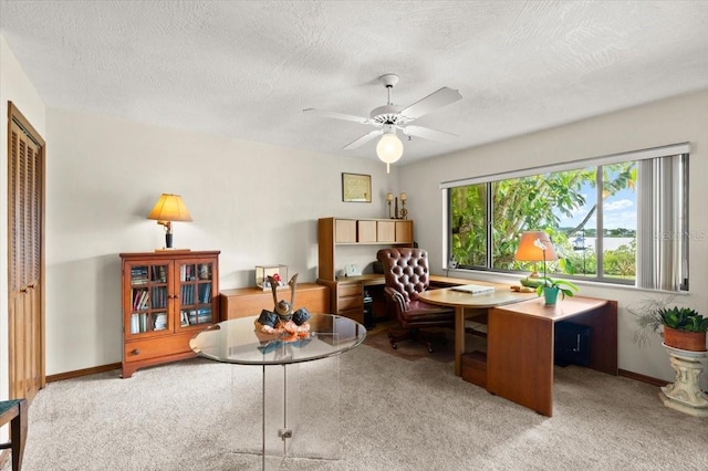 2940 Sunset Dr, New Smyrna Beach, FL 32168 - carpeted office with a textured ceiling and a ceiling fan