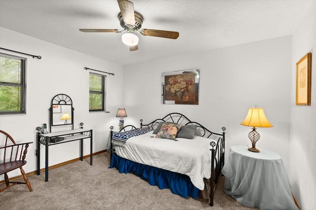 2940 Sunset Dr, New Smyrna Beach, FL 32168 - bedroom with carpet and ceiling fan