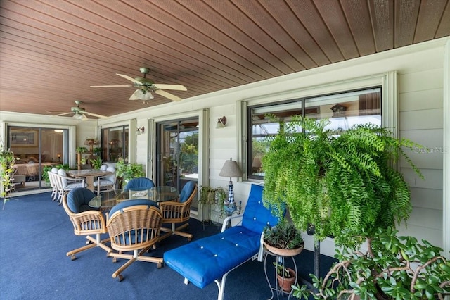 2940 Sunset Dr, New Smyrna Beach, FL 32168 - view of patio with outdoor dining area and ceiling fan