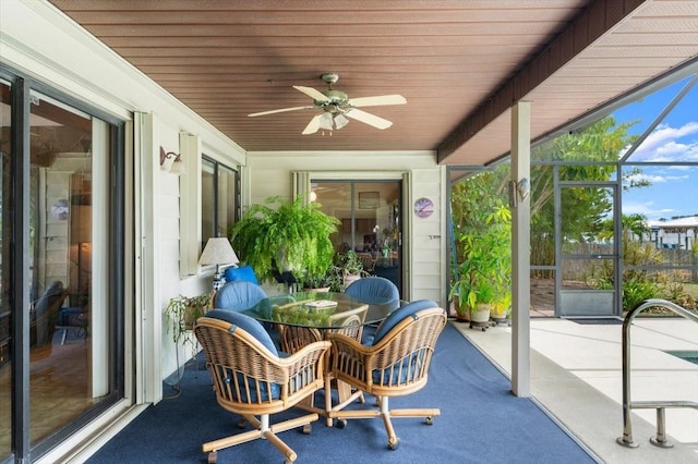 2940 Sunset Dr, New Smyrna Beach, FL 32168 - sunroom with a ceiling fan