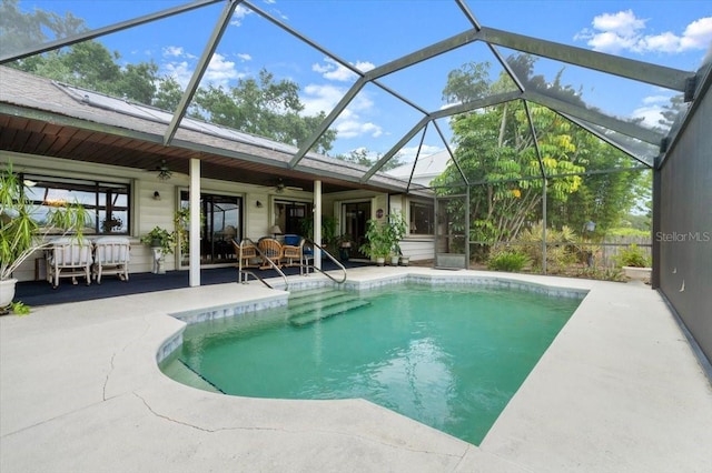 2940 Sunset Dr, New Smyrna Beach, FL 32168 - swimming pool with a ceiling fan, a patio, and a lanai