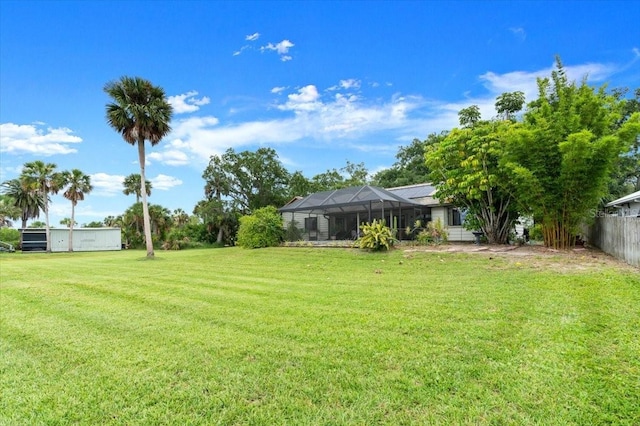 2940 Sunset Dr, New Smyrna Beach, FL 32168 - view of yard with glass enclosure