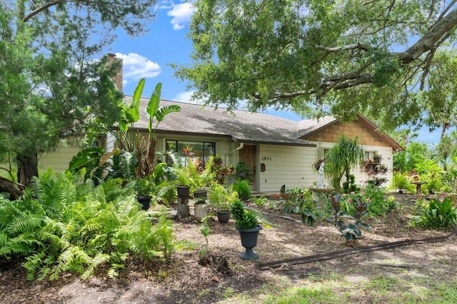 2940 Sunset Dr, New Smyrna Beach, FL 32168 - ranch-style home with a chimney