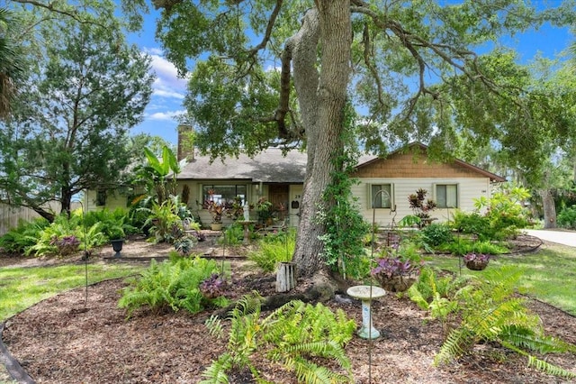 2940 Sunset Dr, New Smyrna Beach, FL 32168 - ranch-style home featuring a chimney