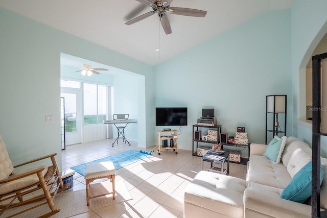47 Summerwind Cir, Palm Coast, FL 32137 - living room featuring ceiling fan, high vaulted ceiling, arched walkways, and light tile patterned floors