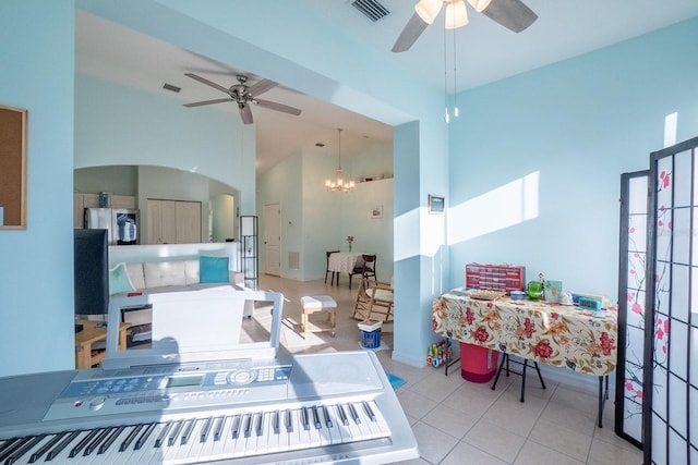 47 Summerwind Cir, Palm Coast, FL 32137 - kitchen featuring ceiling fan, arched walkways, light tile patterned floors, a chandelier, and high vaulted ceiling