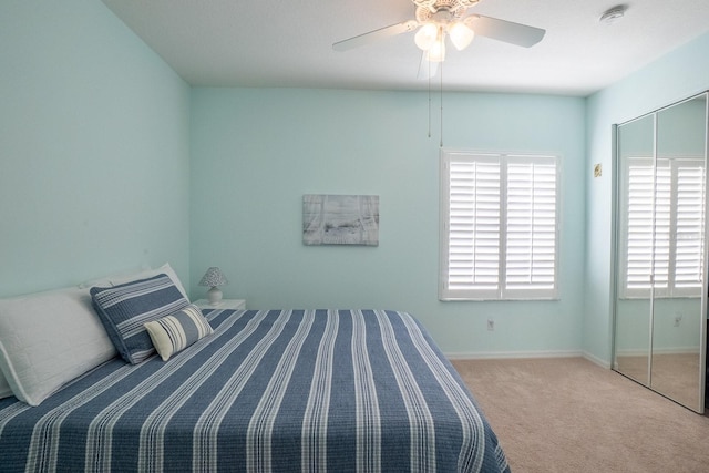 47 Summerwind Cir, Palm Coast, FL 32137 - bedroom featuring carpet flooring, ceiling fan, and a closet