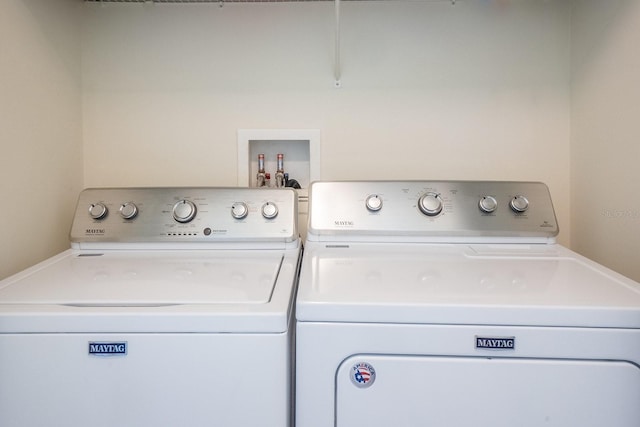 47 Summerwind Cir, Palm Coast, FL 32137 - washroom with washing machine and clothes dryer